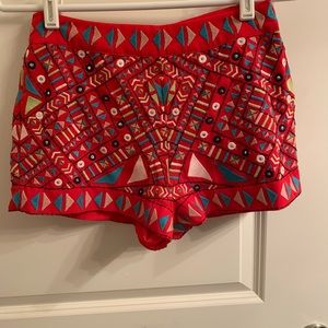 Red shorts size 4 .